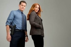 Dylan Walsh as Al Burns and Poppy Montgomery as Carrie Wells in UNFORGETTABLE